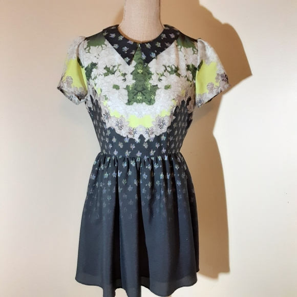 Topshop Dresses & Skirts - Topshop navy dress with green floral prints size 6